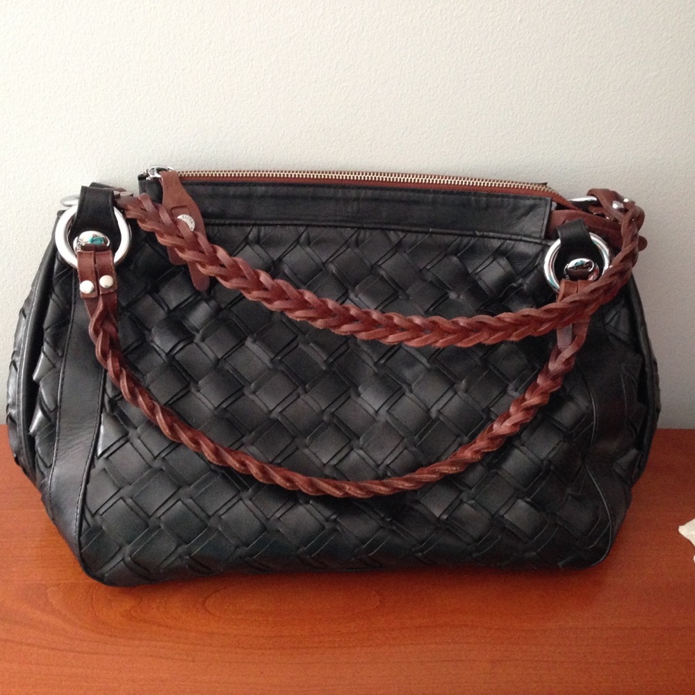 Black leather Elisa Atheniense hand bag.